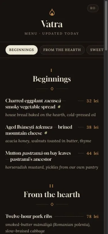 The Vatra QR menu opened at a restaurant table